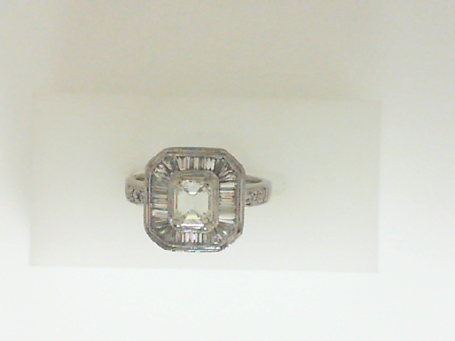 DNR-Plat Ladys Fashion Ring With One 0.75Ct Emerald I Vs1 Diamond, 31=1.00Tw Baguette H Si1 Diamonds And .08 Twt Other Stones