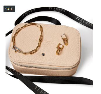 STERLING SILVER GOLD PLATED BRACELET AND EARRING SET WITH CASE.