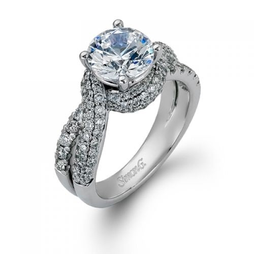 18KW SEMI MT RING 0.63CT VS/G/DIA This beautiful Simon G diamond engagement ring features round brilliant cut diamonds along the band. Simon G (CENTER STONE PURCHASE SEPARATELY)