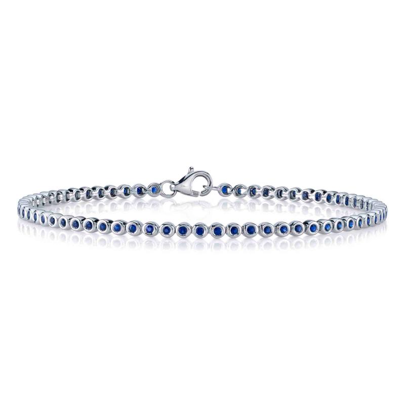 SC55026798 Bezel Tennis Bracelet In 14 Karat White Gold With Round Cut Sapphire