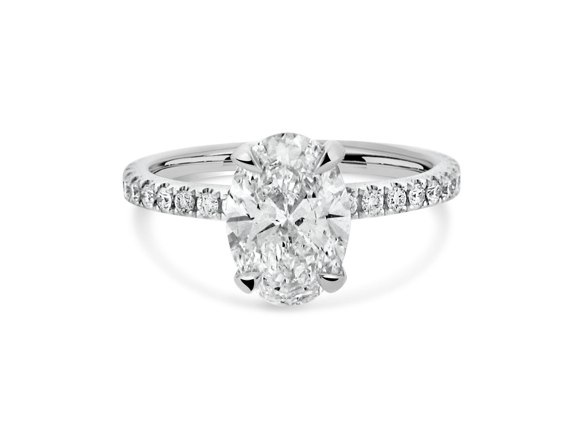 PRIVE' 18K WHITE GOLD 1.94CT SI1 CLARITY AND F COLOR OVAL LAB GROWN SWAROVSKI DIAMOND WITH EXCELLENT CUT AND CERTIFIED. SURROUNDED BY .43CT SI1/G NATURAL ACCENT DIAMONDS