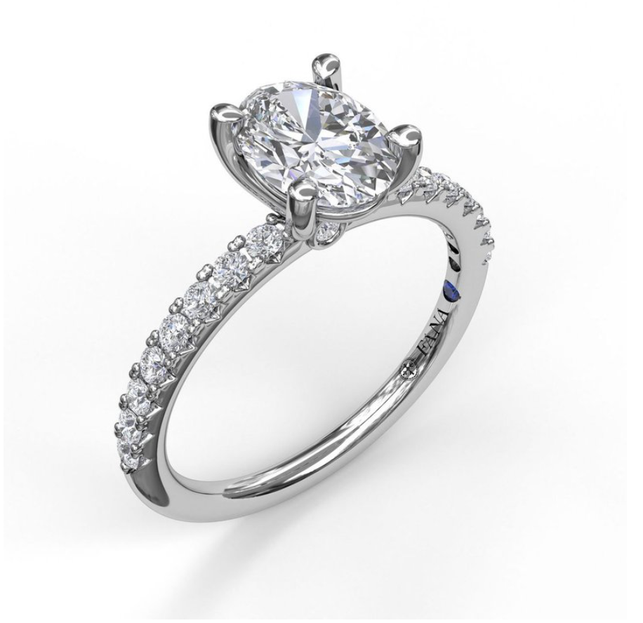 Classic Single Row Engagement ring with an Oval Center Diamond