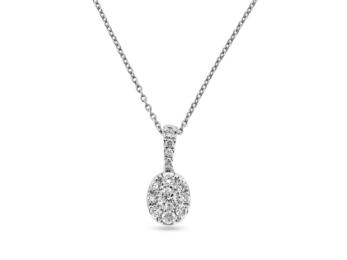 PRIVE'18K WHITE GOLD .29CT VS CLARITY AND G COLOR PENDANT WITH CABLE CHAIN INCLUDED.